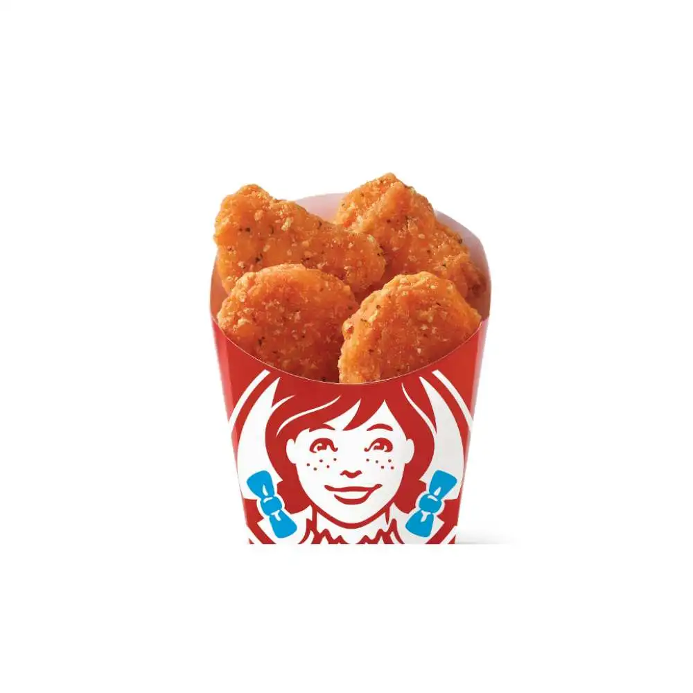 Wendy's Canada Crispy Chicken Nuggets – fresh golden breaded nuggets made with juicy all-white meat chicken, stacked high in the playful red cup with Wendy's iconic smiling logo, crunchy outside and tender inside, tasty value menu snack or side