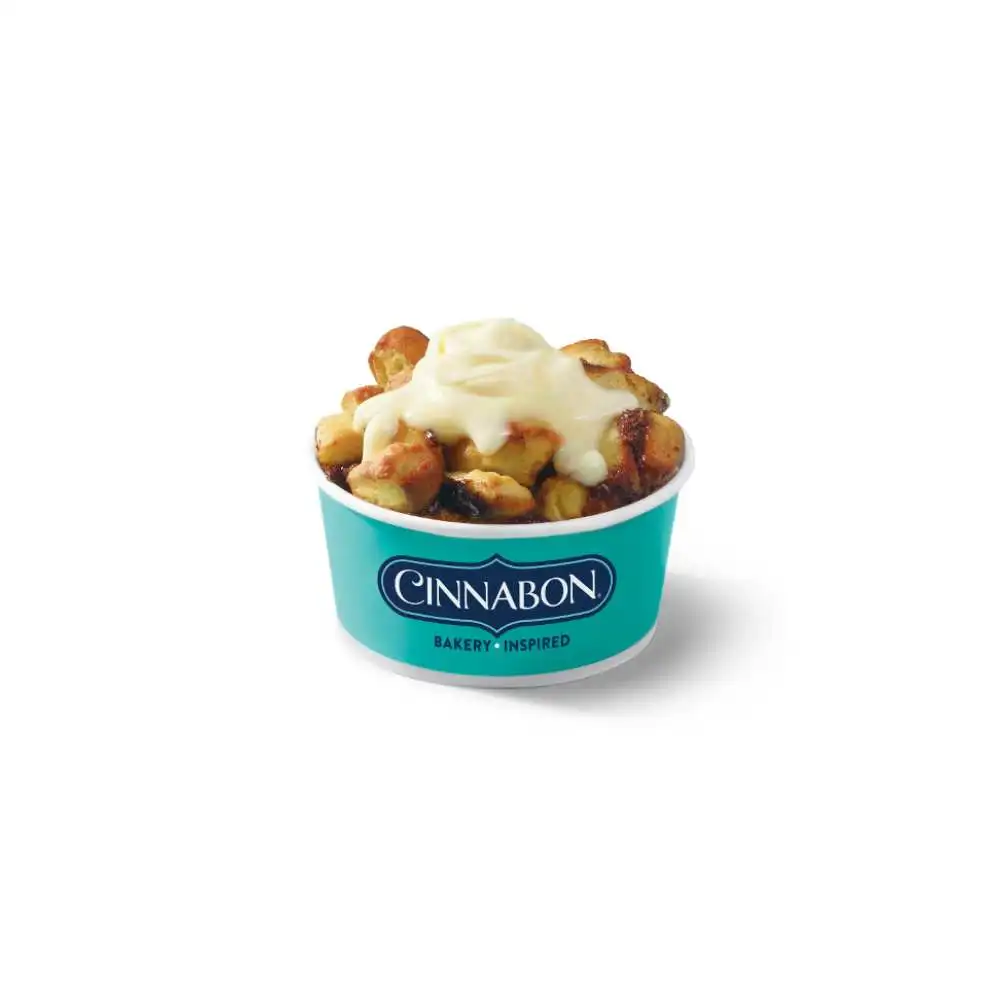 Wendy's Cinnabon pull-apart warm cinnamon bread bites with cream cheese frosting in teal cup