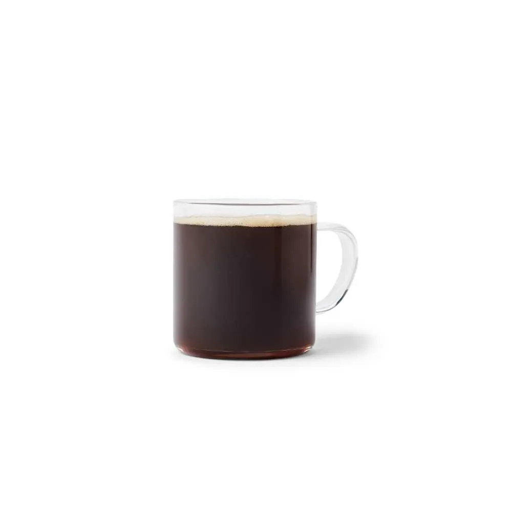 Wendy's Canada Hot Brewed Coffee – freshly poured medium roast Arabica bean coffee in a clear mug with light foam top, smooth and balanced morning drink from the breakfast menu, no added flavors