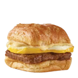 Wendy's sausage egg and swiss croissant with thick sausage patty and fried egg front view